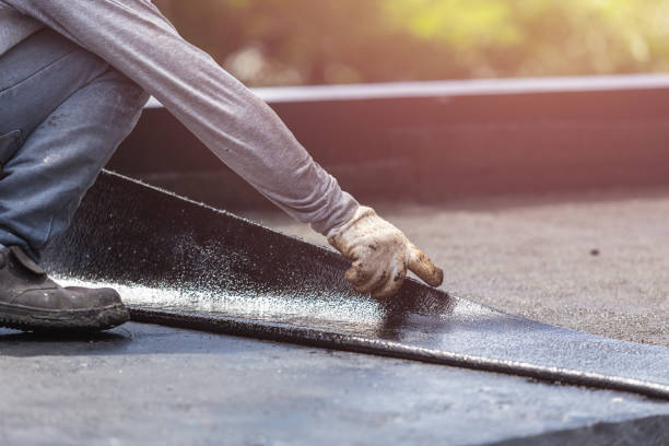 Professional Emergency Waterproofing technician working in Williamsburg, OH